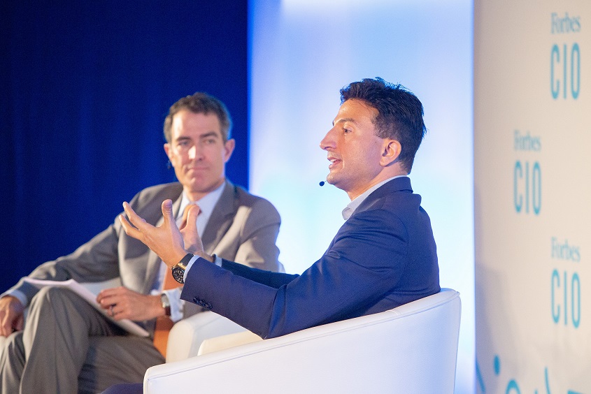Two people in a panel engaging