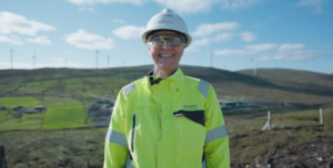Image of Kerstin Linden at wind farm with PPE kit on.
